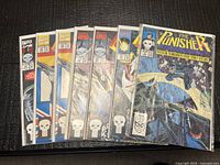 Stack of five bagged The Punisher comics showing partial covers