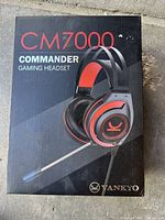 Front of retail box showing CM7000 Commander Gaming Headset branding and product image