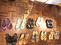 All 11 pairs laid out on wood floor