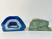 Front view showing colorful blue and green geode bookends side by side