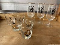 Full set of 7 mixed glasses showing gold rim and bowling motif on clear glassware