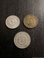 Obverse side of 2, 5, and 20 Dinara coins showing Federal People's Republic of Yugoslavia emblem and inscriptions.