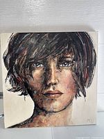 Front view of the oil painting showing the detailed portrait of a woman with short dark hair and a neutral expression.