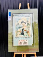 Full view of framed 1918 calendar advertising Superior Animal Fertilizers showing mat and frame.