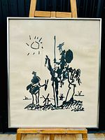 Full view of the framed Picasso "Don Quixote" print displayed on an easel showing the entire artwork and frame.