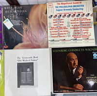 Four vinyl album covers including Arthur Fiedler conducting the Boston Pops, The Philadelphia Orchestra conducted by Eugene Ormandy, The Greencastle Band, and Steinberg conducting Wagner with The Pittsburgh Symphony Orchestra.