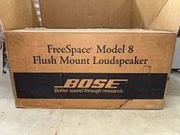 Outer cardboard box labeled FreeSpace Model 8 Flush Mount Loudspeaker and Bose logo.