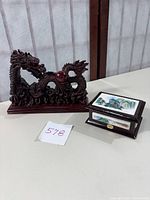 Photo showing full lot with dragon sculpture and trinket box together