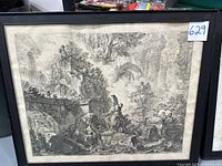 Front view of framed art print featuring Statue of Minerva in a classical ruin setting, black-and-white, stained.