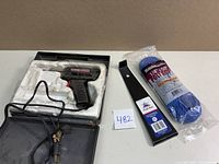 Weller hot knife, poly rope, and pull bar displayed together in case and packaging.