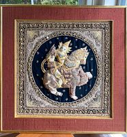 Full view of the framed vintage Burmese Kalaga tapestry showing the silk fabric mat and gold frame.