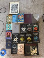 All items laid out flat showing front covers of all books