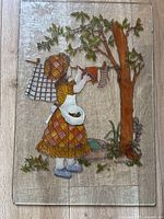 Full stained glass panel showing the complete laundry scene with girl, tree, and clothes on clothesline.