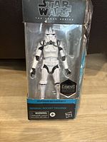 Front view of Star Wars Imperial Rocket Trooper action figure in original packaging showing figure and box details.