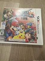 Front cover of the game case showing full cover art with Nintendo characters and game title.