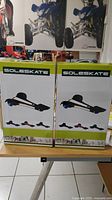 Front view of two boxes of SoleSkate showing product image and branding