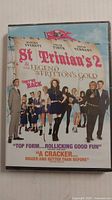 Front cover of St. Trinian's 2 DVD showing main characters and promotional text