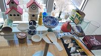 overview of birdhouses, ceramics, glassware