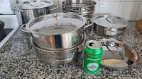 Overview of stainless steel cookware set on countertop