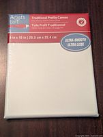 Front of the sealed Artist's Loft traditional profile canvas, showing brand, size, and smooth surface label.