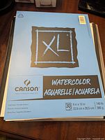 Front packaging of Canson XL Watercolor Paper pack showing product details and branding.