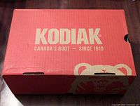 Red Kodiak shoe box with logo and branding, showing 'Canada's Boot - Since 1910'