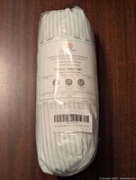 Front view of the Luxury 1000 Thread Count Twin XL sheet set packaging showing brand Casa Vertiny, product features such as oxygen washed microfiber, and confirming Twin XL size.