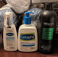 Front view showing Cetaphil Gentle Foaming Cleanser, Cetaphil Oily Skin Cleanser, and TreSemme Shampoo bottles arranged side by side.