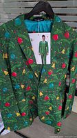 Front view of Christmas suit jacket on hanger with attached tag showing full suit image