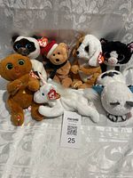 Full lot of 8 Ty plush toys including Beanie Babies and Beanie Bellies, arranged on white fabric background with Maxsold lot card