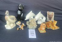 Displaying entire collection of various vintage animal figurines showing different species and styles.