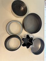 Overview of all baking pans showing shapes, sizes, and layering of tortilla pans.