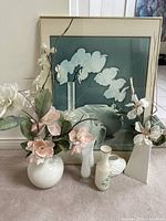 Full view of framed picture with 6 vases and artificial flowers