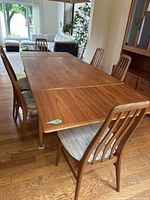 Full view of table extended with chairs