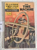Front cover of Classics Illustrated comic book The Time Machine No. 133 with vintage priced 15 cents and illustrated man on a time machine propeller device.