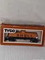 HO scale Tyco Shell train car tank model in original packaging.