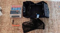All items: boxed car top carrier, trunk organizer, cargo net, hook