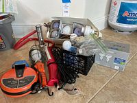 Group shot of all lighting items including reel light, trouble light, fluorescent light, LED module box and assorted bulbs