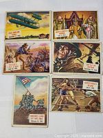 Groups of six vintage trading cards from 1952 Topps Scoops series showing historical events and figures.