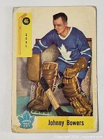 Front of 1958-59 Parkhurst Johnny Bower hockey card showing player in Leafs uniform in goalie stance, card #46.