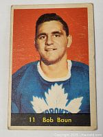 Front side of 1960-61 Parkhurst Bob Baun hockey card showing player portrait in Toronto Maple Leafs jersey with number 11