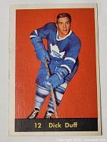 Front side of the 1960-61 Parkhurst hockey card showing Dick Duff in Toronto Maple Leafs uniform with number 12.
