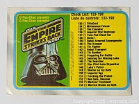 Front side of the 1980 OPC Star Wars Empire Strikes Back checklist card showing Darth Vader image and checklist of cards.