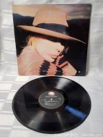 Photo of the vinyl disc side showing the Geffen Records label for Joni Mitchell Chalk Mark In A Rain Storm album.