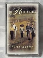 Front cover of the cassette case showing the album artwork with band members and the title 'North Country'.