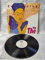 Photo of the vintage Soul Mining LP vinyl laid flat with the cover behind it, showing front artwork and the record label.