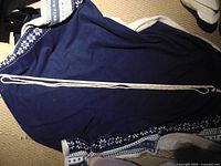 Full length of pearl strand laid flat on fabric