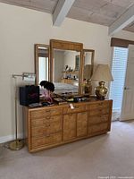 Wide view of dresser, mirror and top contents