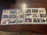Two photos showing two pages each of Batman trading cards with various characters and scenes.