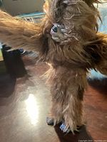 Photo of McFarlane werewolf figurine in upright position showing front with arms extended and detailed fur and face features